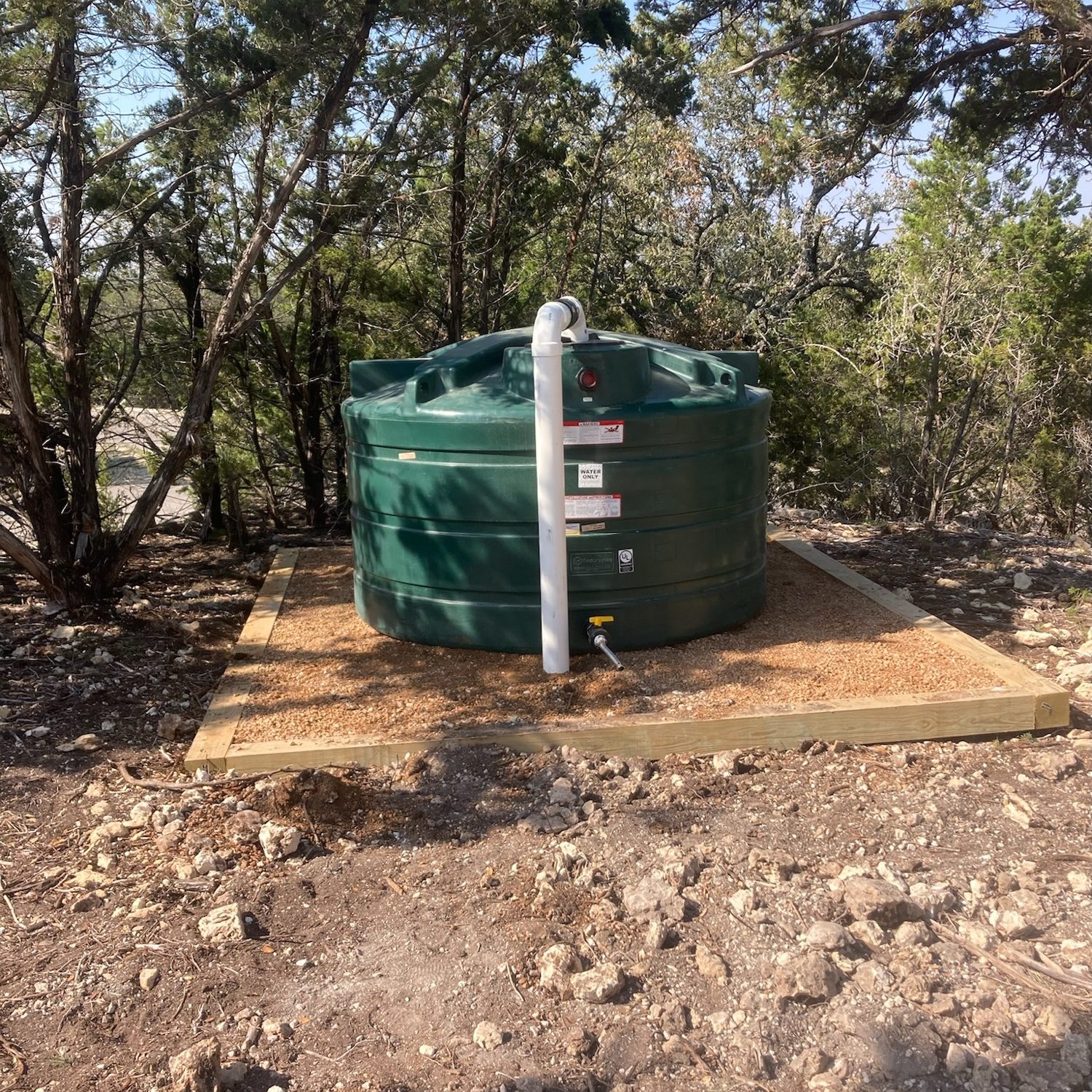 green rainwater tank in wimberly texas
